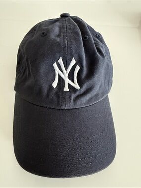 Genuine Merchandise Navy Hat with White Embroidered Logo
